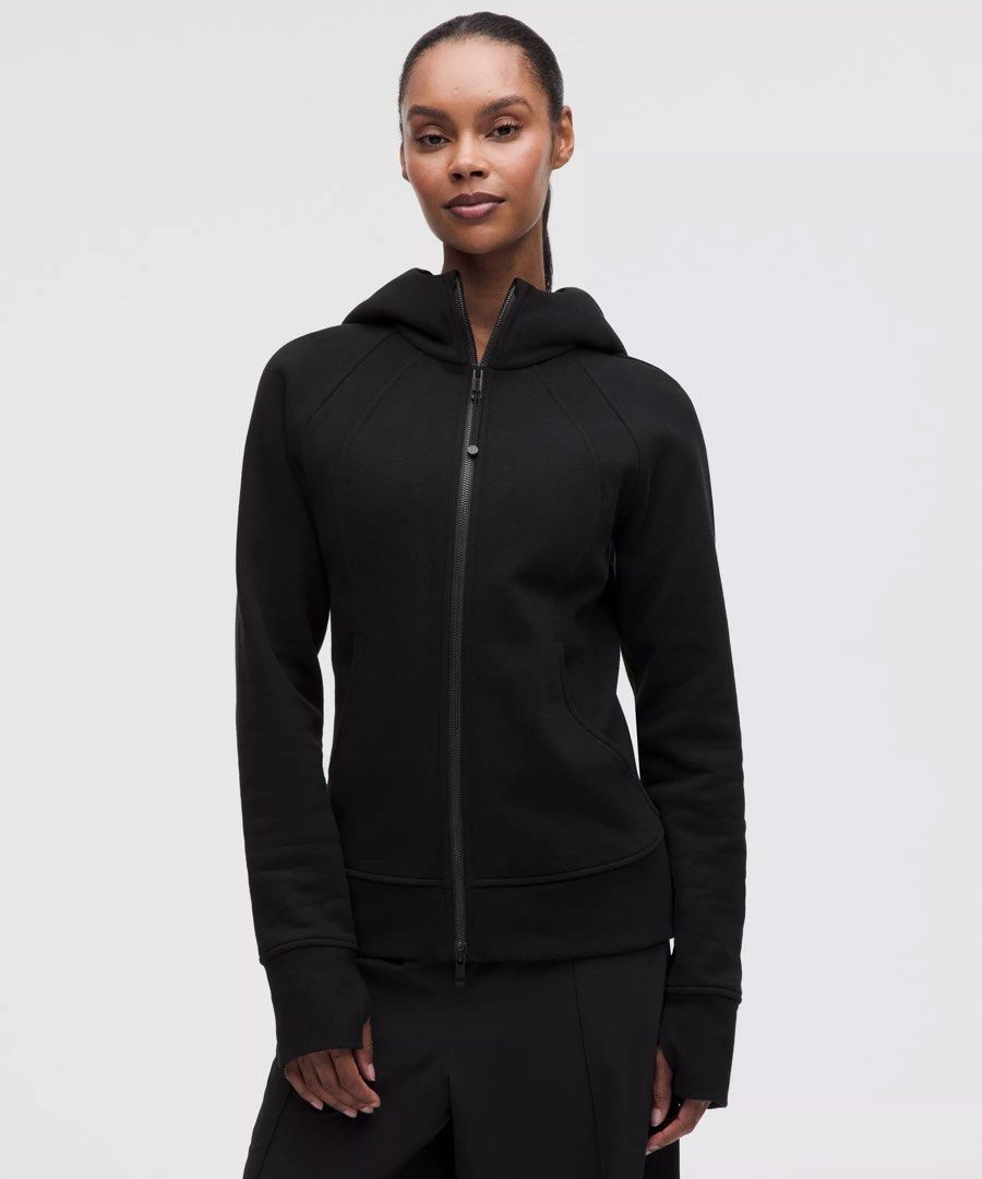Lululemon Black Zip-Up Hoodie (Category: Coats, Jackets and Outerwear) located in Buenavista. Submitted by ivoperez27 (Listing ID 1470403568, Image 2). Description: - Brand: Lululemon - Color: Solid Black - 19 width 23.5 length - Style: Full-zip hoodie with long sleeves - Details: Signature logo zip pull, embroidered logo on the hood - Fit/Comfort: Ribbed side panels and cuffs for a great fit - Condition: Clean and well-maintained.