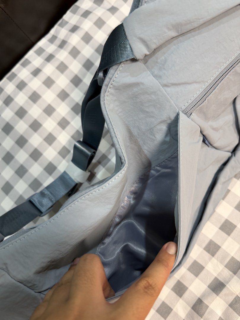 Lululemon Large Slouchy Sling Bag (Category: Cross-body Bags) located in Makati City. Submitted by gigidvd (Listing ID 1470444948, Image 3). Description: - Brand new Light Classic Blue Slouchy Sling Bag - Curved silhouette that tucks close to the body - Adjustable shoulder strap for a custom fit - Storage: Zippered main compartment with interior organization pockets.