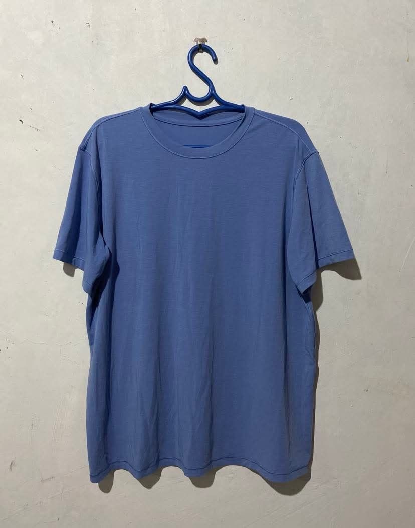 Lululemon Mens Zeroed Shirt Blue Size XL (Category: Activewear) located in Meycauayan. Submitted by epicforest_231b9d (Listing ID 1470353130, Image 3). Description: - Brand/Model: Lululemon Men's Zeroed In Shirt - Color: Blue - Size: XL - Measurements: Width 22" | Length 27" - Details: Classic short sleeve crewneck with signature logo near bottom hem - Condition: Clean fabric, no flaws, well-kept.