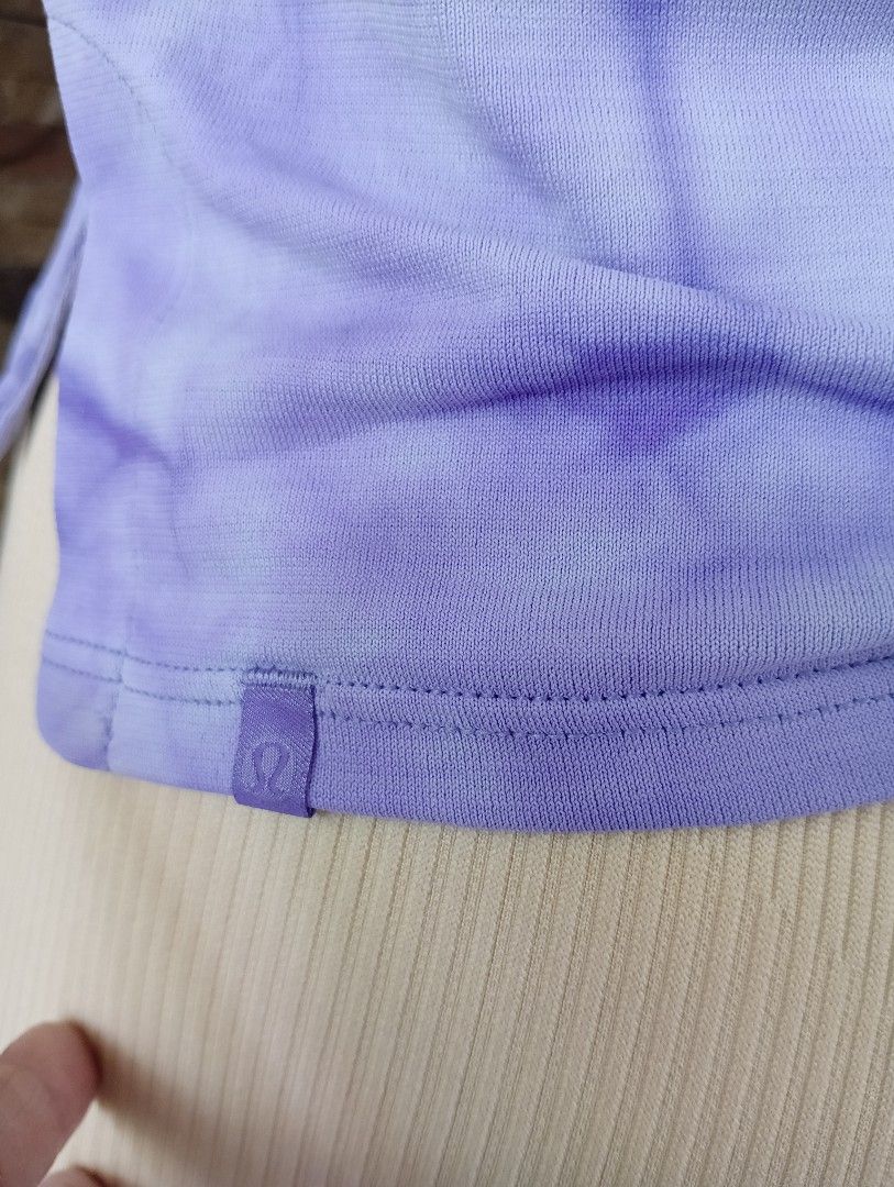 Lululemon Tank Top (Category: Activewear) located in Rizal. Submitted by timeless_shop (Listing ID 1470381118, Image 3). Description: Original Lululemon Trained to Be Tank Size 6 📏 Size: Dot 6 📝 Details: - Length: 19 inches - Width: 16 inches flat laid - Fabric: Breathable, light & quick-dry - Design: Tie dye pattern + side slit - Style: Relaxed fit, nice color too Condition: 9.9/10 - Like New Almost - No stain , No issue - Color Rate: 9.9/10 -