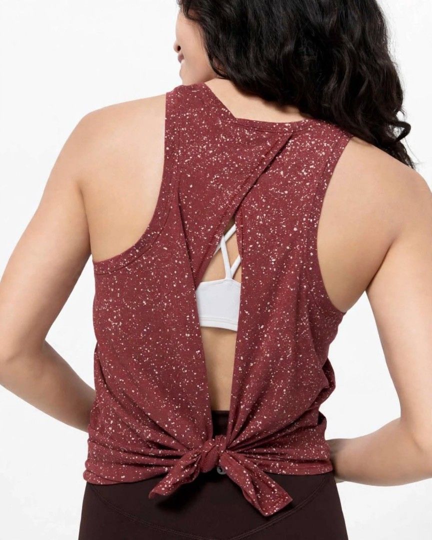 Lululemon Tank Top (Category: Activewear) located in Rizal. Submitted by timeless_shop (Listing ID 1470387987, Image 2). Description: LULULEMON Tie-Back Tank Top - Maroon Speckled / Rust Red ✨ Size 8 📏 Length: 27 inches 📏 Width: 16 inches lay flat inches 📏 Size Fit: Small to Medium - S-M 🎨 Color: Maroon / Rust Red with White Speckles ✂️ Style: Sleeveless Tank - Racerback + Open Back with Tie - Yoga / Gym! 💯 Good Condition: 9.7/10 Malinis ito