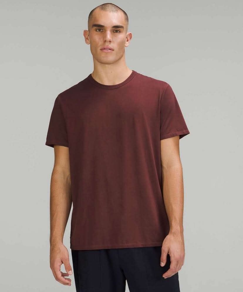 Lululemon Zeroed In Short Sleeve Shirt Size XL (Category: Activewear) located in Meycauayan. Submitted by epicforest_231b9d (Listing ID 1470353057, Image 2). Description: - Brand: Lululemon - Style: Zeroed In Short Sleeve Shirt - Color: Maroon Red - Size: XL - Dimensions: Width 22" x Length 27" - Fit: Regular fit with crew neckline and short sleeves - Details: Soft fabric with iconic small reflective logo near bottom hem - Condition: Clean, well 