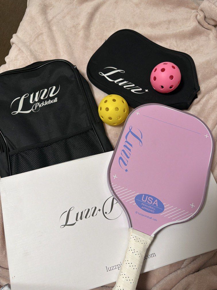 Luzz Pickleball Paddle Sandblasted (Category: Racket and Ball Sports) located in Manila. Submitted by hellosonnyx (Listing ID 1470461607, Image 1). Description: Used occasionally. Comes with protective edge tape. with minimal signs of wear. box, bag, racket cover, ball included rfs: will upgrade.