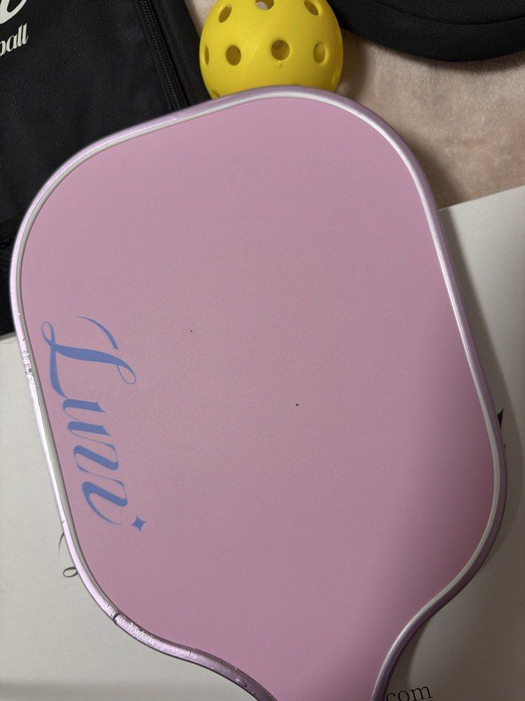 Luzz Pickleball Paddle Sandblasted (Category: Racket and Ball Sports) located in Manila. Submitted by hellosonnyx (Listing ID 1470461607, Image 2). Description: Used occasionally. Comes with protective edge tape. with minimal signs of wear. box, bag, racket cover, ball included rfs: will upgrade.