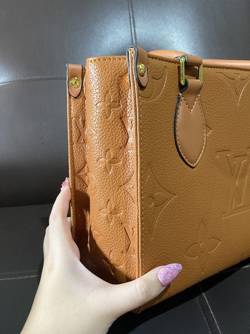 LV OTG (Category: Luxury Bags & Wallets) located in Manila. Submitted by altheajwu (Listing ID 1470390254, Image 2). Description: - LV OTG: Good as new, have not been used at all (NOT OG) - Has shoulder strap for crossbody - Good quality leather - Suede lining and Gold Hardware - Small size.