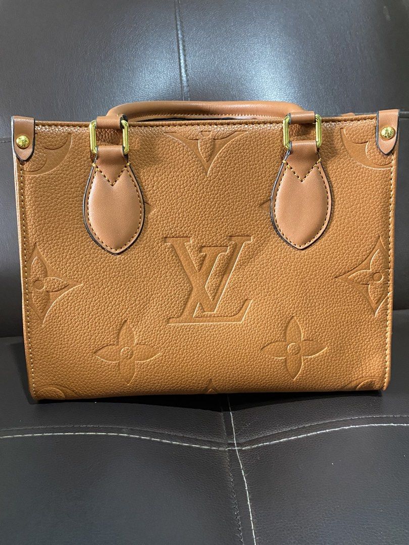 LV OTG (Category: Luxury Bags & Wallets) located in Manila. Submitted by altheajwu (Listing ID 1470390254, Image 1). Description: - LV OTG: Good as new, have not been used at all (NOT OG) - Has shoulder strap for crossbody - Good quality leather - Suede lining and Gold Hardware - Small size.