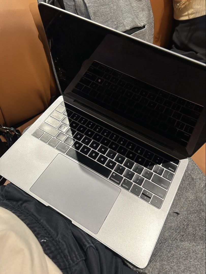 MacBook Pro A2159 (Category: Laptops & Notebooks) located in Manila. Submitted by christophe22089 (Listing ID 1470499244, Image 3). Description: - Model: MacBook Pro (Model A2159) - Color: Sleek Silver -Touchbar -Intel I5 16gb ram - Condition: Clean screen, all rubber feet intact, minor surface wear from daily carry - Features: Standard keyboard layout and large trackpad ISSUE: di nag oopen SSD sira WORKING ORIG LCD/ ORIG ALL PARTS NO ICLOUD .