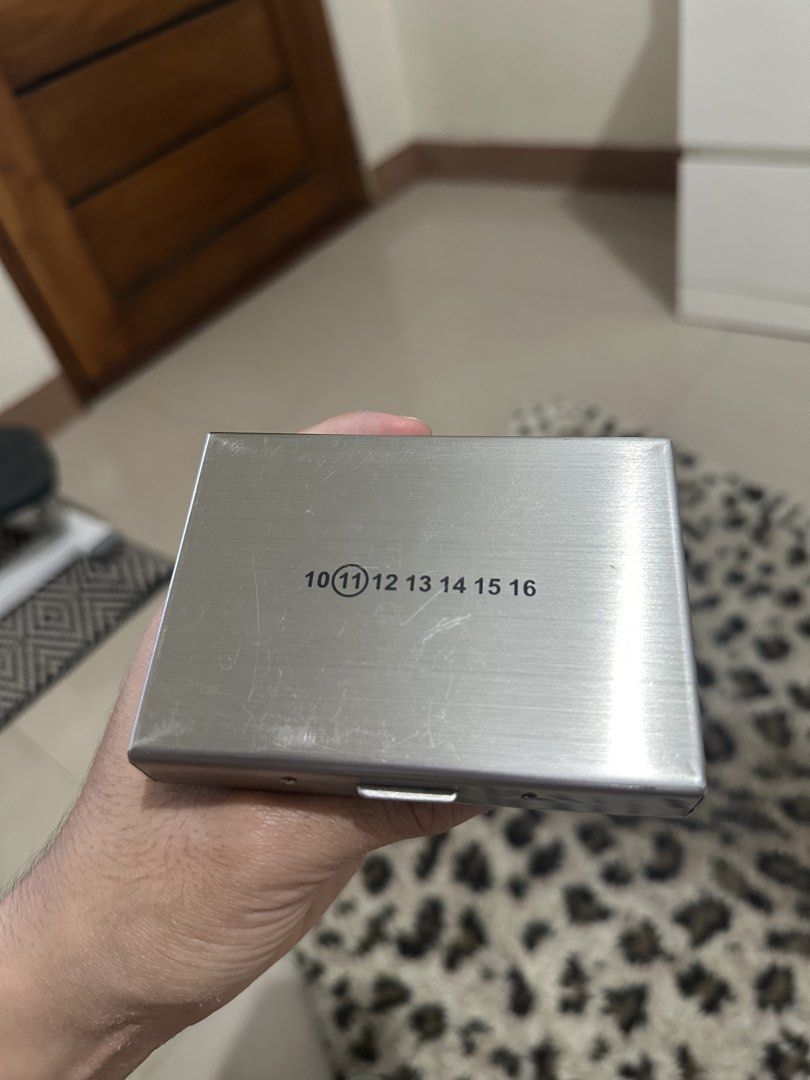 Maison Margiela Card Holder (Category: Luxury Bags & Wallets) located in Nasugbu. Submitted by diornght (Listing ID 1470554922, Image 3). Description: - Cigarette / Card Holder - 10 Card Slots Interior - Minor scratches due to usage.