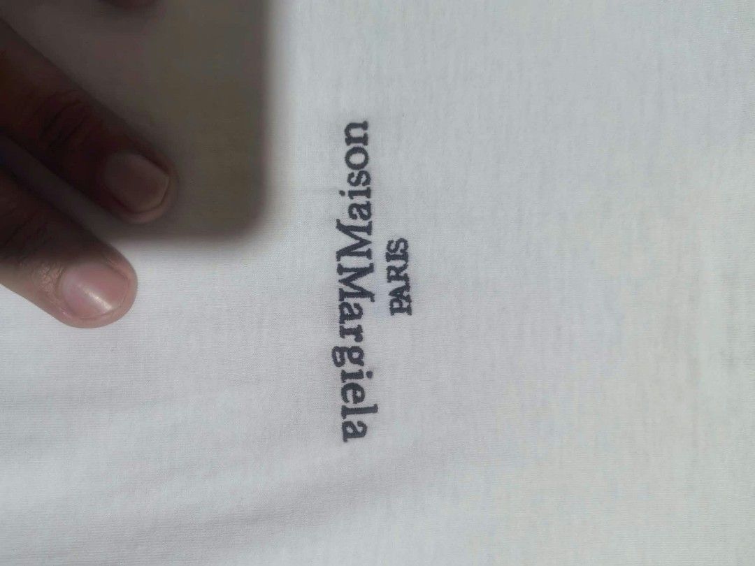 Maison margiela Embroidered tes (Category: Luxury Apparel) located in Vinzons. Submitted by kspabico07187 (Listing ID 1470502793, Image 3). Description: Excellent condition Almost brandnew condition L-28 W-22.5.