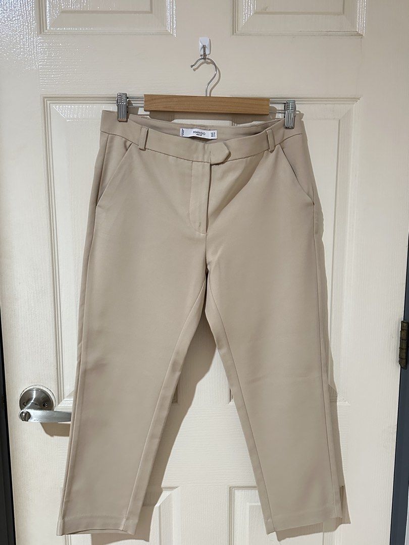 Mango Basics Beige Trousers Size EUR 38 (Category: Trousers) located in Manila. Submitted by ktyyycloset (Listing ID 1470528659, Image 2). Description: - Brand: Mango Basics - Color: Classic Beige - Size: EUR 38, USA 6, MEX 5 - Features: Tailored design, belt loops, front pockets, back welt pocket - Origin: Made in Bangladesh.