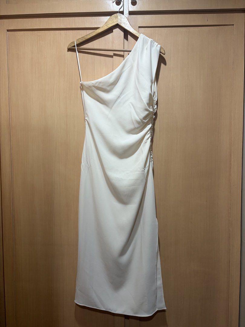 Mango One Sided Dress (Category: Dresses) located in Muntinlupa City. Submitted by itsrosecloset (Listing ID 1470475584, Image 2). Description: Brand new with tag .