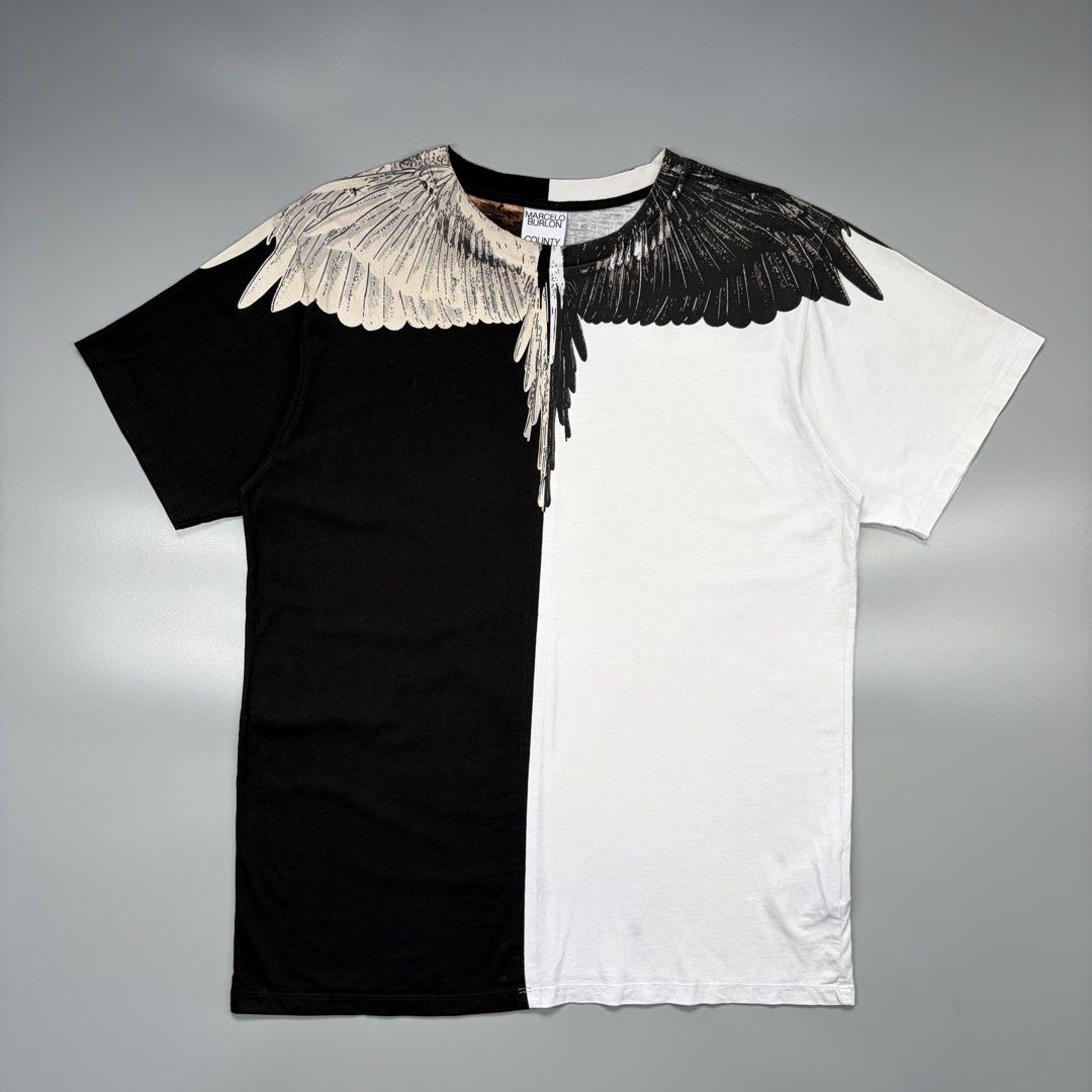Marcelo Burlon Bi colour (Authentic) (Category: Luxury Apparel) located in Cavite. Submitted by onebeancent (Listing ID 1470556960, Image 2). Description: Size: Large to Semi XL | XXL (Women's) Dimension: 22" Width | 29" Length Color: Black & White Color Rate: 10/10 Issue: None Condition: Like new‼️ Price: 1,950php Additional Shipping Fee (J&T Small Pouch) 75php Luzon 100php visayas 120php mindanao.