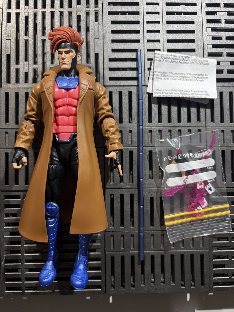 Marvel Legends X-Men 97 Gambit Action Figure (Category: Figurines & Statues) located in Quezon City. Submitted by KRC07 (Listing ID 1470456822, Image 1). Description: - Item: Hasbro X-Men '97 Gambit Action Figure - Look: Classic brown trench coat, blue & pink suit, reddish-brown hair - Condition: Joint movement fully intact, clean paint applications - Inclusions: Staff, small accessories, original baggie, and instruction manual - Perfect for X-Me