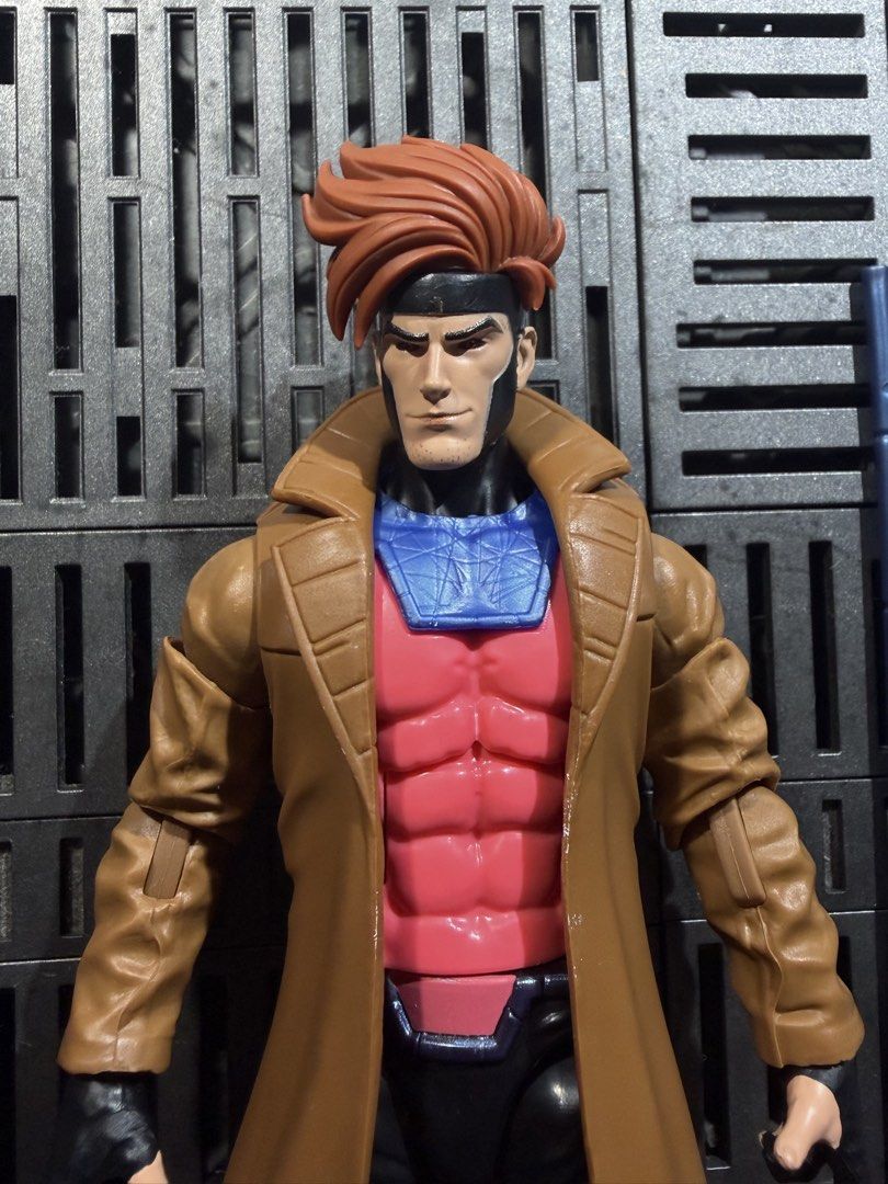 Marvel Legends X-Men 97 Gambit Action Figure (Category: Figurines & Statues) located in Quezon City. Submitted by KRC07 (Listing ID 1470456822, Image 2). Description: - Item: Hasbro X-Men '97 Gambit Action Figure - Look: Classic brown trench coat, blue & pink suit, reddish-brown hair - Condition: Joint movement fully intact, clean paint applications - Inclusions: Staff, small accessories, original baggie, and instruction manual - Perfect for X-Me