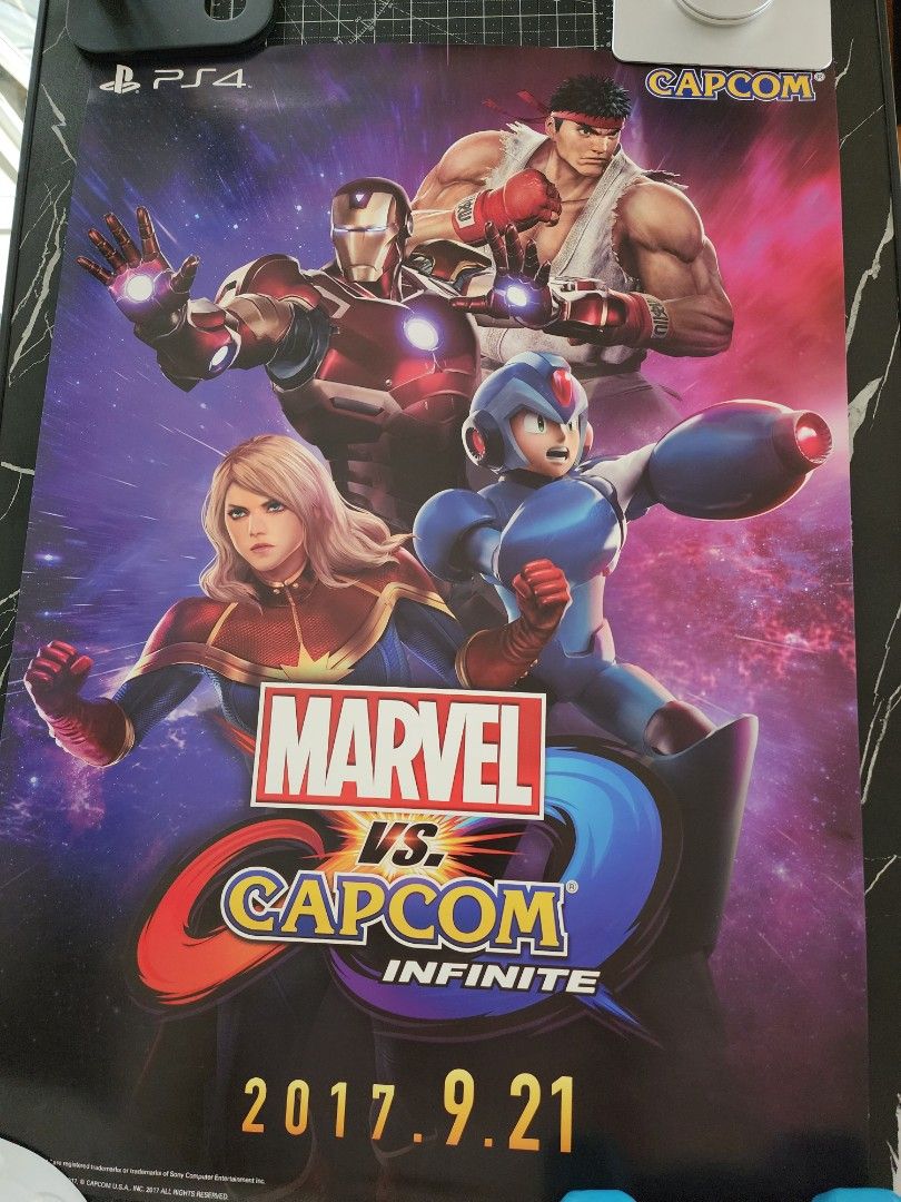 Marvel vs. Capcom: Infinite Promotional Poster PS4 (Category: PlayStation) located in Quezon City. Submitted by kristeenl556 (Listing ID 1470405392, Image 2). Description: - Official promotional poster for Marvel vs. Capcom: Infinite on PS4 - Features iconic artwork of Ryu, Mega Man X, Iron Man, and Captain Marvel - Official release date (2017.9.21) printed on the side - Excellent wall decor for fighting game fans and collectors - Stored flat and