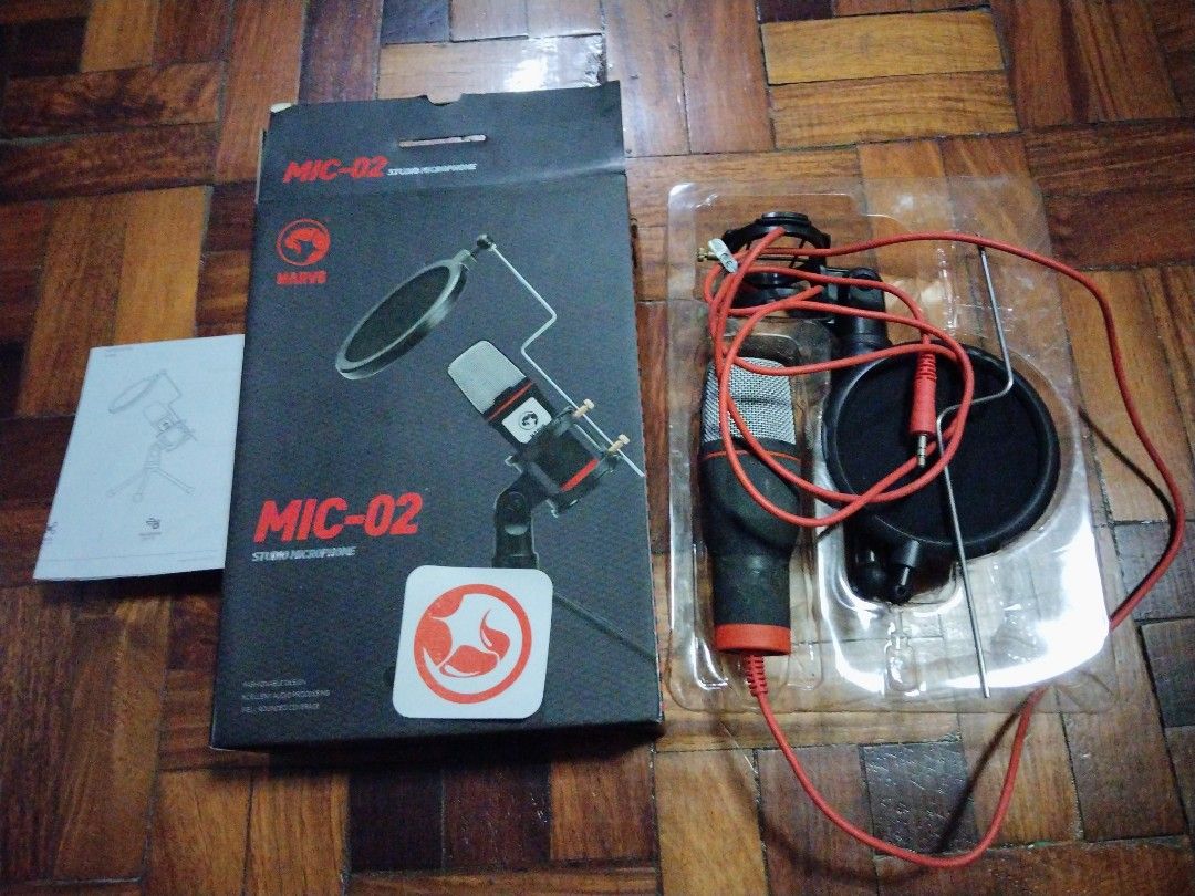 Marvo MIC-02 Studio Microphone – ₱550 (Category: Microphones) located in Antipolo. Submitted by skkiyoshin (Listing ID 1470489338, Image 3). Description: - Model: Marvo MIC-02 Studio Microphone Set - Condition: Tested and working fine - Perfect for: Streaming, podcasting, and gaming - Inclusions: Tripod stand, pop filter, red 3.5mm cable, original box, and manual - Great budget-friendly audio setup Used only a few times and still works perfectly.