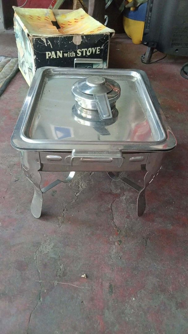 Maspion Group Pan with Stove Stainless Steel Buffet Server (Category: Cookware & Accessories) located in Manila. Submitted by wisegem-231b (Listing ID 1470391696, Image 3). Description: - Brand: Maspion Group - Material: High-quality stainless steel with glass lid - Complete set: Includes stands and burner - Condition: Brand new item in original box (box shows minor wear) - Perfect for: Parties, catering, and family gatherings - Easy to use and c