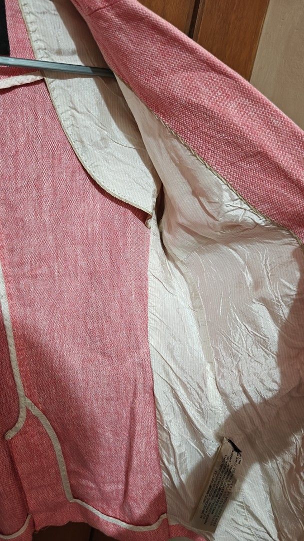 Massimo Dutti Pink Linen Blazer (Category: Coats, Jackets and Outerwear) located in Makati City. Submitted by tbstuff (Listing ID 1470375098, Image 2). Description: - Brand: Massimo Dutti - Origin: Made in Romania - Color: Pink - Material: Textured linen blend with visible weave - Design: Classic lapel, single-button front closure, front welt pockets - Fit: Tailored cut with structured shoulders and back seam detailing - Lining: Fully lined inter