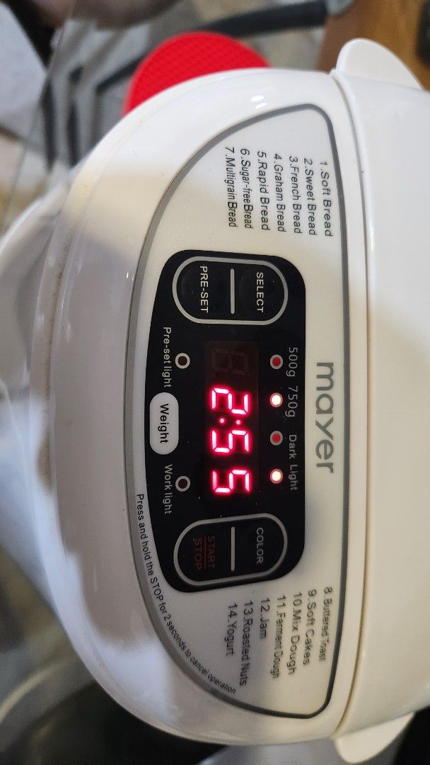 Mayer Multi Function Bread Maker MMBM12 (Category: Breadmakers) located in Singapore. Submitted by extremedeclutterer (Listing ID 1470545139, Image 5). Description: - Model: Mayer Multi-Function Bread Maker MMBM12 - Capacity: 750g - Features: 14 baking functions and 15-hour delay timer - Power: 220-240V, 530 watts - Condition: Tested, powers on, and digital display works - Includes: Baking pan, measuring cup, oven mitts, instruction manual, and o