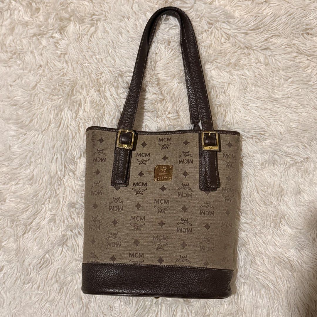 MCM Vintage Monogram Canvas (Category: Luxury Bags & Wallets) located in Pasay City. Submitted by erinsclosetph (Listing ID 1470505974, Image 1). Description: Vintage piece in Rank AB condition. Shows signs of age, including canvas discoloration, tarnished hardware, a dirty interior, and scratches on the top corner of the canvas. More pictures available upon request. No inclusions. .