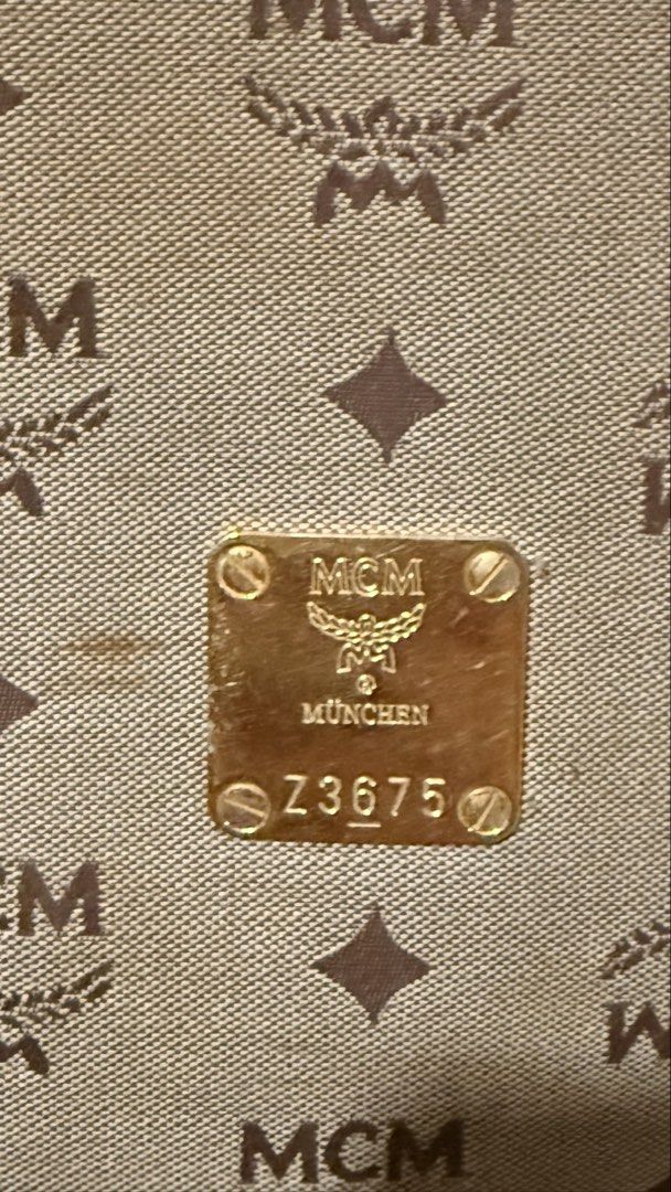 MCM Vintage Monogram Canvas (Category: Luxury Bags & Wallets) located in Pasay City. Submitted by erinsclosetph (Listing ID 1470505974, Image 3). Description: Vintage piece in Rank AB condition. Shows signs of age, including canvas discoloration, tarnished hardware, a dirty interior, and scratches on the top corner of the canvas. More pictures available upon request. No inclusions. .