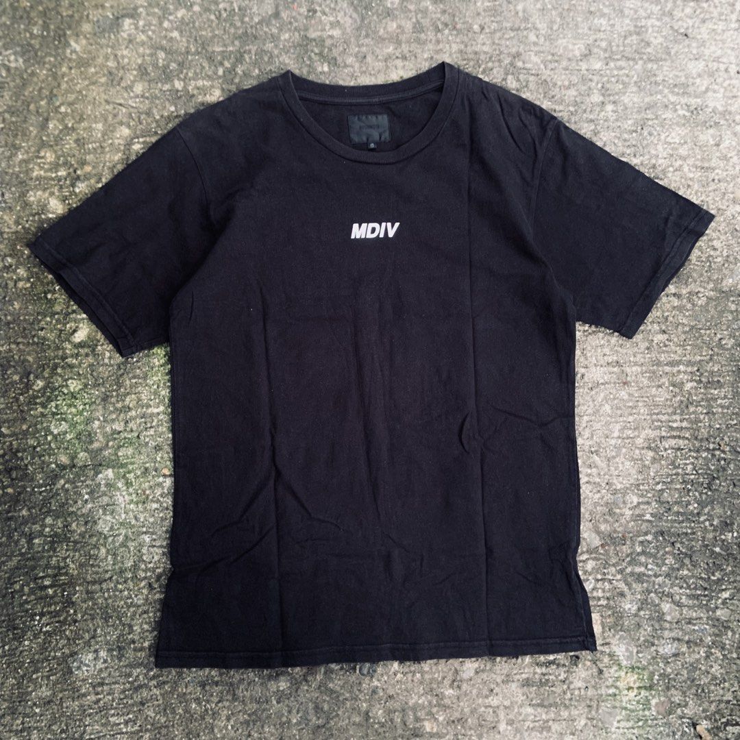 MDIV AC1D DRU5 S3X Black T-Shirt (Category: Tshirts & Polo Shirts ) located in Tabaco. Submitted by bayhust (Listing ID 1470480510, Image 3). Description: 19.5x26.5 EXCELELNT NO ISSUE 9.4/10 color rate - Color: Black - Design: Small white MDIV logo on chest - Fit: Standard fit with crew neck - Material: Soft, comfortable cotton - Versatile: Easy to match with jeans or shorts - Condition: Brand new with tag.