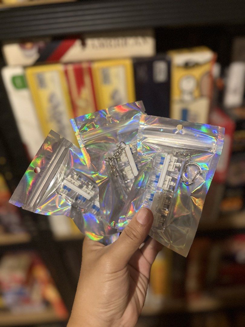 Mechanical Keyboard Switch Fidget Clicky Keychain Toy (Category: Computer Keyboard) located in San Mateo. Submitted by tiktok.tiktok (Listing ID 1470505747, Image 1). Description: - Made from real mechanical keyboard switches for a super satisfying click - Brand new and individually packed in a shiny holographic resealable bag - Perfect as a fidget toy or charm for keys, bags, and lanyards - Multiple pieces available if you want to buy more .