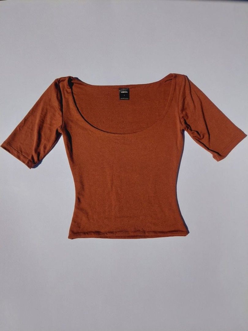 Mera fitted top (Category: Blouses) located in Echague. Submitted by ribbitpicks (Listing ID 1470413052, Image 1). Description: bust 28 to 32 length 17.5.