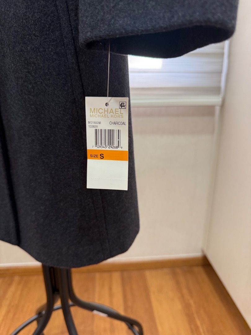 Michael Kors Charcoal Wool Blend Belted Trench Coat (Category: Coats, Jackets and Outerwear) located in Quezon City. Submitted by docangela (Listing ID 1470443563, Image 3). Description: - Brand: Michael Kors - Color: Charcoal grey - Size: Small (S) - Condition: Brand new with original retail tags attached - Design: Double-breasted front with gold buttons, notch lapel collar, and mid-length cut - Includes: Matching waist belt with buckle.