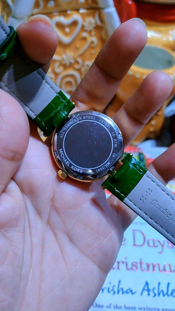 Michael Kors Green Dial Watch MK-2592 (Category: Women's Watches) located in Baliuag. Submitted by marieannfernando23 (Listing ID 1470366969, Image 3). Description: - Brand: Michael Kors (Model: MK-2592) - Dial: Striking green dial with a dazzling crystal bezel - Case: Elegant gold-tone case with 10 ATM water resistance - Strap: Shiny green leather strap with minimal wear - Condition: Clean crystal face, well-maintained .