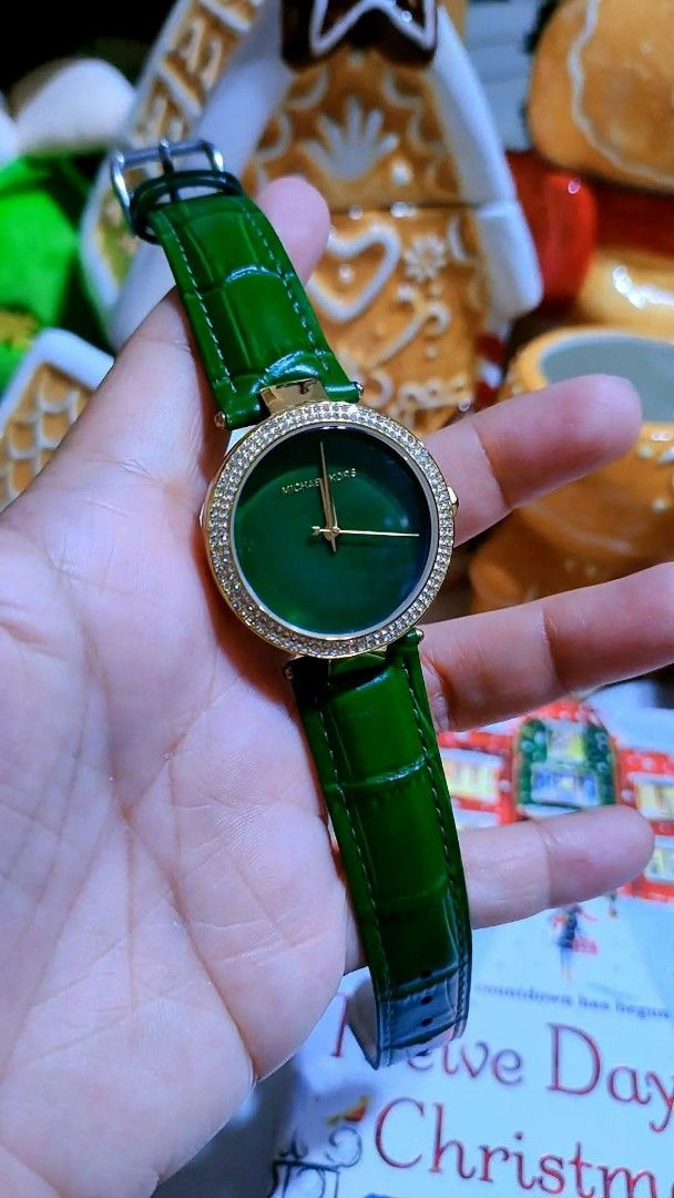 Michael Kors Green Dial Watch MK-2592 (Category: Women's Watches) located in Baliuag. Submitted by marieannfernando23 (Listing ID 1470366969, Image 1). Description: - Brand: Michael Kors (Model: MK-2592) - Dial: Striking green dial with a dazzling crystal bezel - Case: Elegant gold-tone case with 10 ATM water resistance - Strap: Shiny green leather strap with minimal wear - Condition: Clean crystal face, well-maintained .