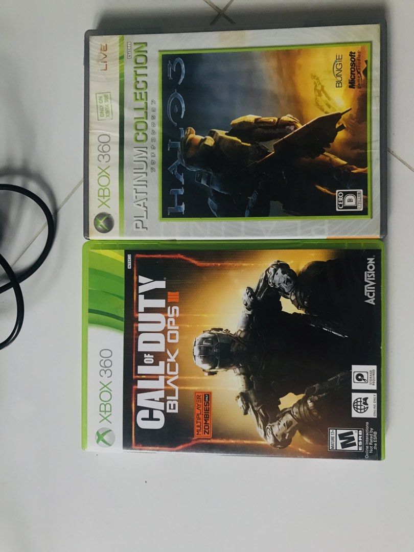 Xbox 360 Slim Console Bundle with Controller and Games (Not-Jtag/RGH) (Category: Xbox) located in Agoncillo. Submitted by miguelitobingphilippines (Listing ID 1470386043, Image 3). Description: - Item: Black Microsoft Xbox 360 Slim Console Bundle - Condition: Clean, tested, and ready to set up and play - Controller: 1x wired black controller included - Accessories: Original power brick included - Physical Games: Call of Duty Black Ops III & Halo 