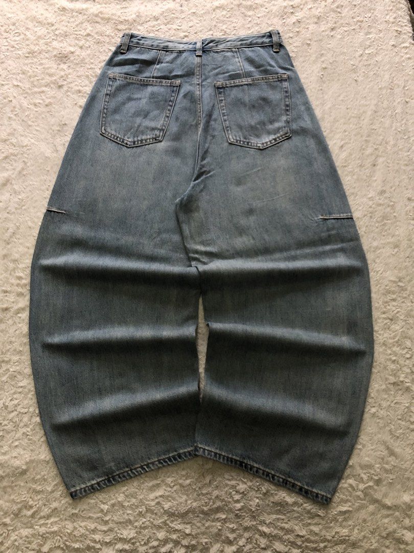 mid-wash blue denim, Barrel-leg pants (Category: Jeans) located in Canaman. Submitted by thriftmoboss (Listing ID 1470454593, Image 1). Description: 📌 mid-wash blue denim, Barrel-leg pants ___________________________ No available model ___________________________ 📏DIMENSION (INCHES) Waistline:30 length:40 tight:14 leg opening:10.5 ___________________________ ♻️DETAILS Condition:good condition Color rate:9.5/10 Fabric used:soft denim Issues:N/A 