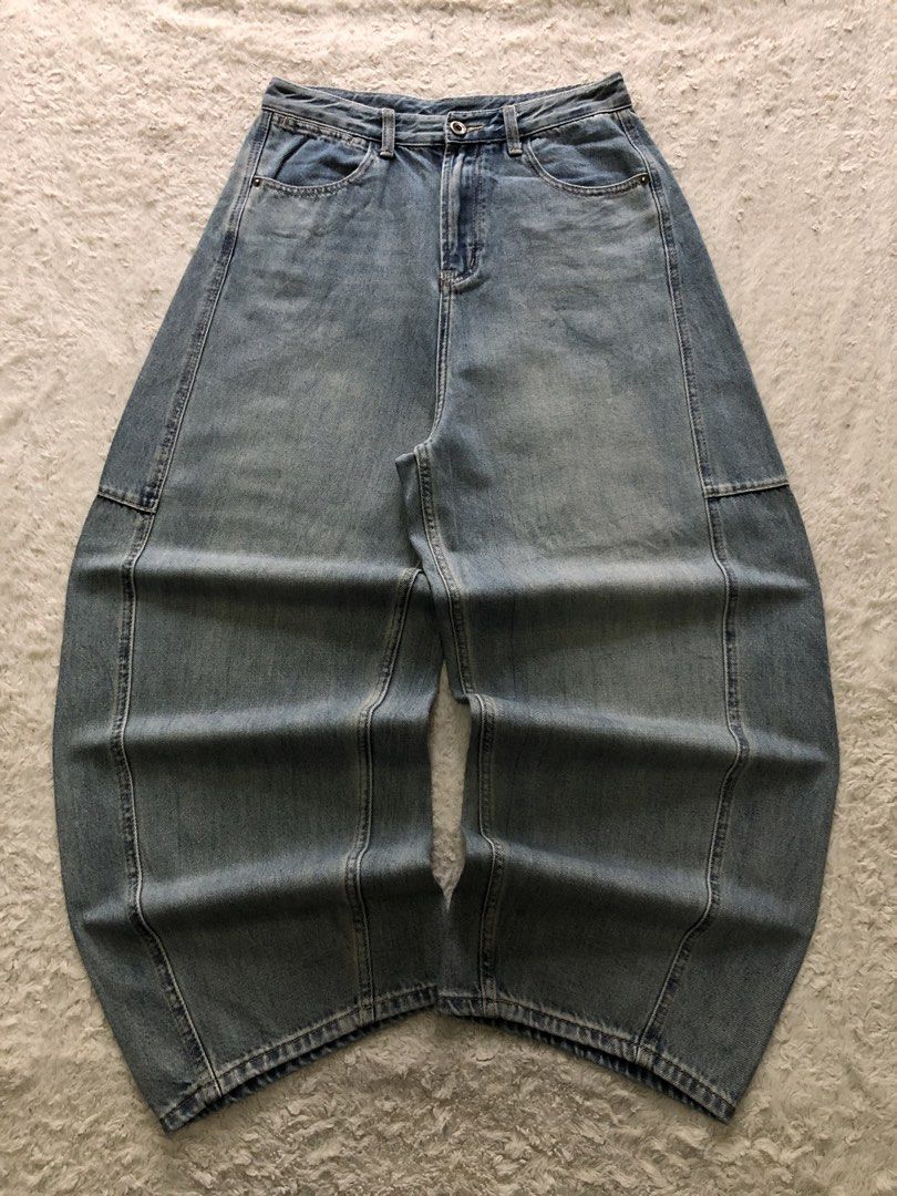 mid-wash blue denim, Barrel-leg pants (Category: Jeans) located in Canaman. Submitted by thriftmoboss (Listing ID 1470454593, Image 2). Description: 📌 mid-wash blue denim, Barrel-leg pants ___________________________ No available model ___________________________ 📏DIMENSION (INCHES) Waistline:30 length:40 tight:14 leg opening:10.5 ___________________________ ♻️DETAILS Condition:good condition Color rate:9.5/10 Fabric used:soft denim Issues:N/A 
