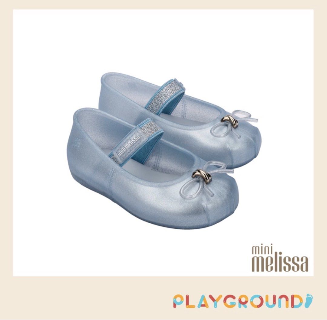Mini Melissa Glitter Ballet Flats (Category: Babies & Kids Fashion) located in Silang. Submitted by gelobitspieces (Listing ID 1470411882, Image 2). Description: - Brand: Mini Melissa - Style: Glitter ballet flats / Mary Jane with elastic strap and front bow - Color: Light blue - Size: EUR 27 / USA 10 / JPN 16.5 - Condition/Inclusions: Original box included - Perfect footwear choice for little ones.