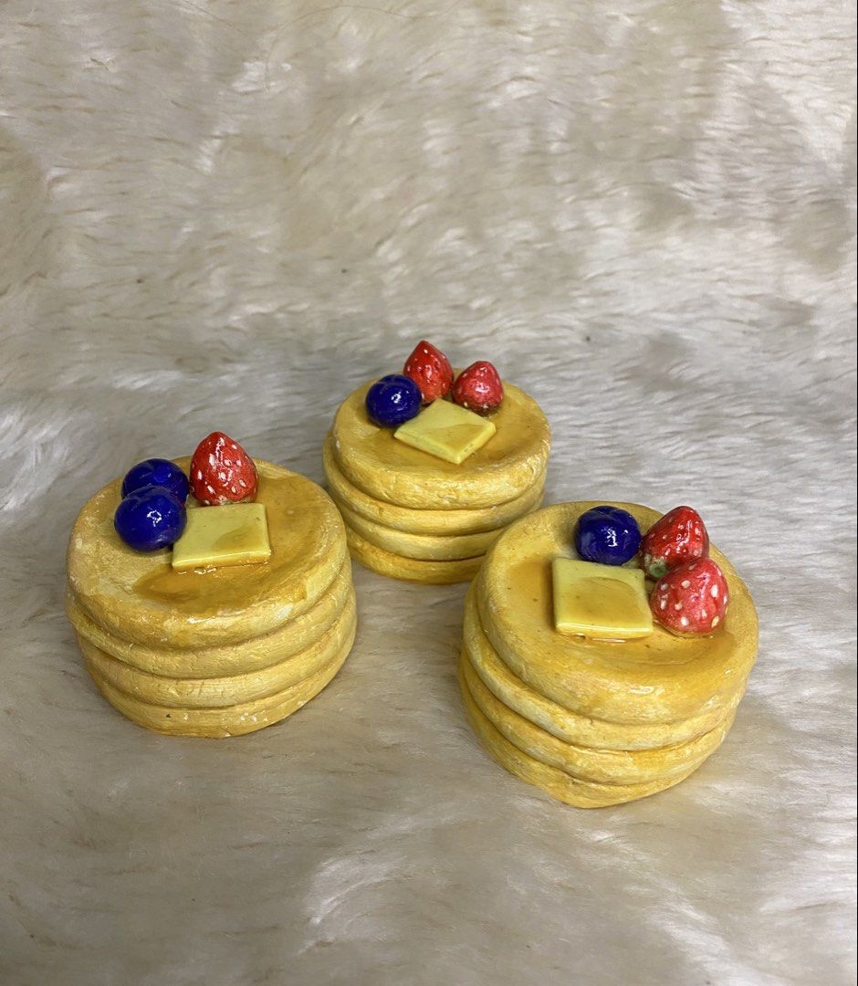 Miniature Pancake Stack Trinket (Category: Accessory Holder, Box & Organizers) located in Manila. Submitted by littleatorie.studio (Listing ID 1470543758, Image 1). Description: - Miniature pancake stack displays - Features detailed toppings: butter, blueberries, and strawberries - Glossy glazed finish looks just like real syrup - Perfect fun decor for your desk, dollhouse, or kitchen shelf - Best for storing rings, jewelries,keys.