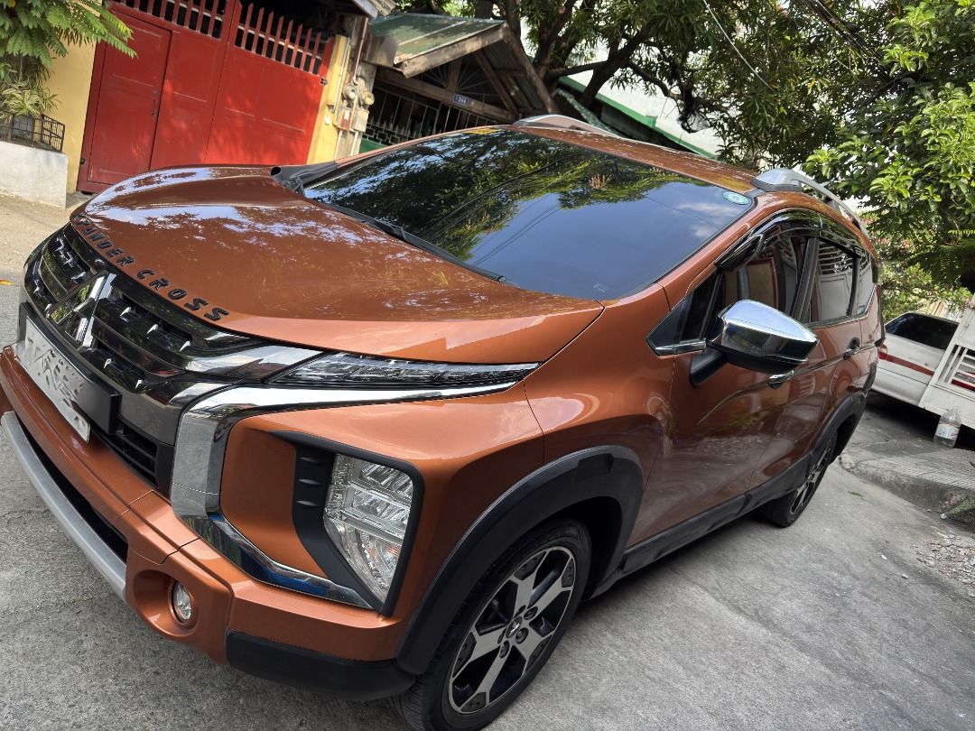 Mitsubishi XPANDER CROSS Auto (Category: Used Cars) located in Taguig. Submitted by ejamesarbis (Listing ID 1470355573, Image 3). Description: Model: Xpander Cross 2020 Color: Sunrise Orange Purchased November 25, 2020 (1st Owner) Milage: 67K Price:750k RFS: Upgrade Issues: Minor scratches due to small rocks, minor gutter marks on mags Upgrades and Accessories included • Original tools (jack, tow hitch, wrench, original spare tire w/ mitsu mags) 