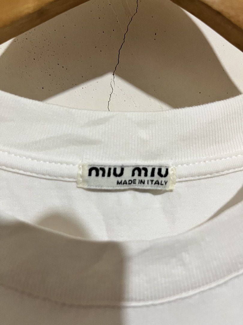 Miu miu (Category: Shirts) located in San Francisco. Submitted by dckim_19 (Listing ID 1470513070, Image 3). Description: excellent condition Size medium Width: 18 Length: 25.
