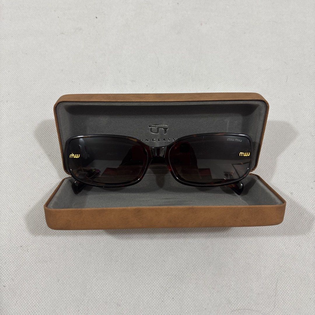 Miu miu eyewear sunglasses (Category: Sunglasses & Eyewear) located in Cavite. Submitted by itsayaaa (Listing ID 1470542294, Image 3). Description: No issue Excellent Condition .
