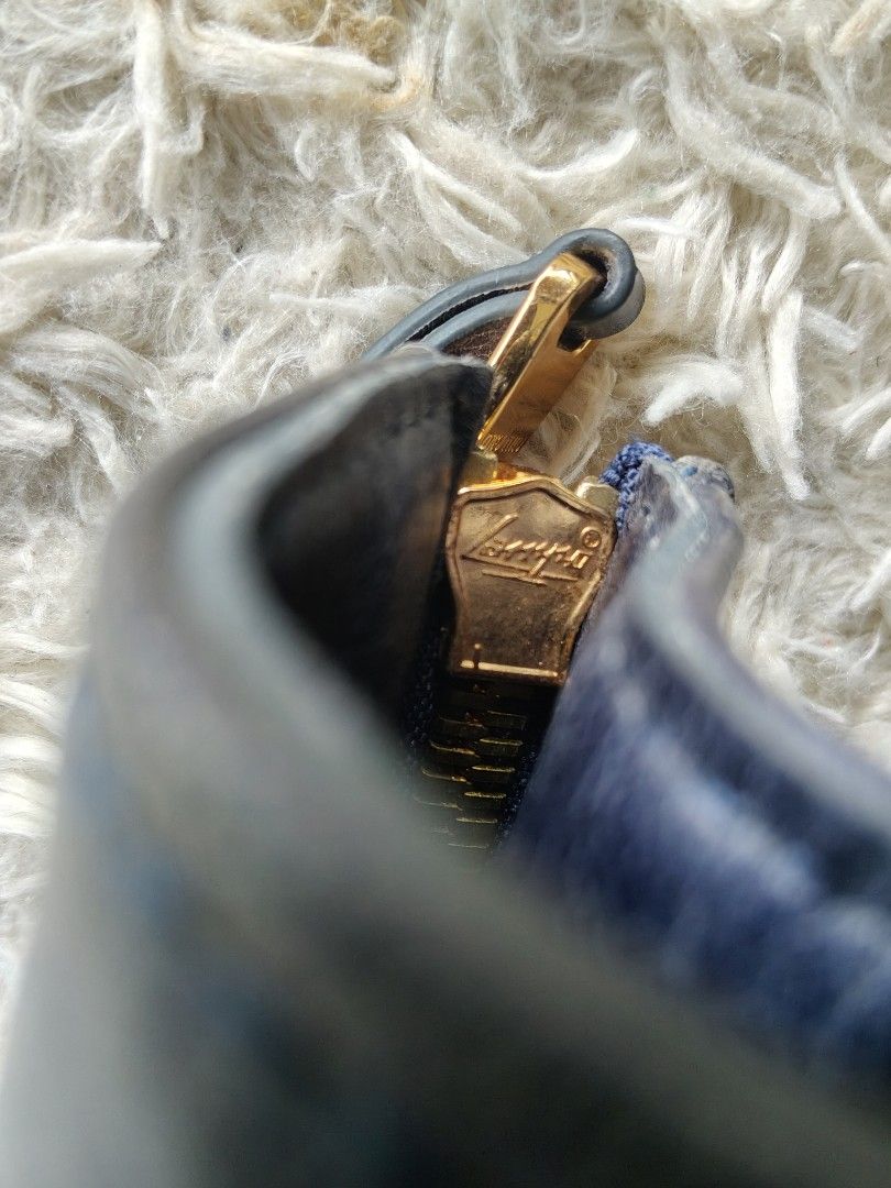 MIU MIU MATELASSE LEATHER SATCHEL (Category: Luxury Bags & Wallets) located in Valencia. Submitted by coolwolf_27a64f (Listing ID 1470366800, Image 3). Description: Authentic Miu Miu Matelassé Leather Satchel Bag in Navy Blue 🔵 ✨ Features the iconic gathered matelassé quilting, dual structured top handles, and a detachable crossbody strap for versatile styling. Complemented by striking gold-tone hardware and the classic front logo lettering. Per