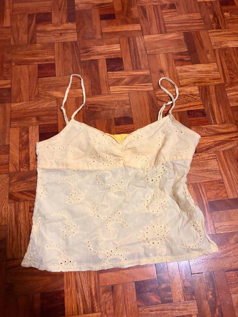 Miu the Label Soleil Eyelet Top (Category: Sleeveless) located in Rizal. Submitted by mikaria715 (Listing ID 1470513111, Image 1). Description: - Soleil Eyelet Top in Yellow - Used only once or twice.