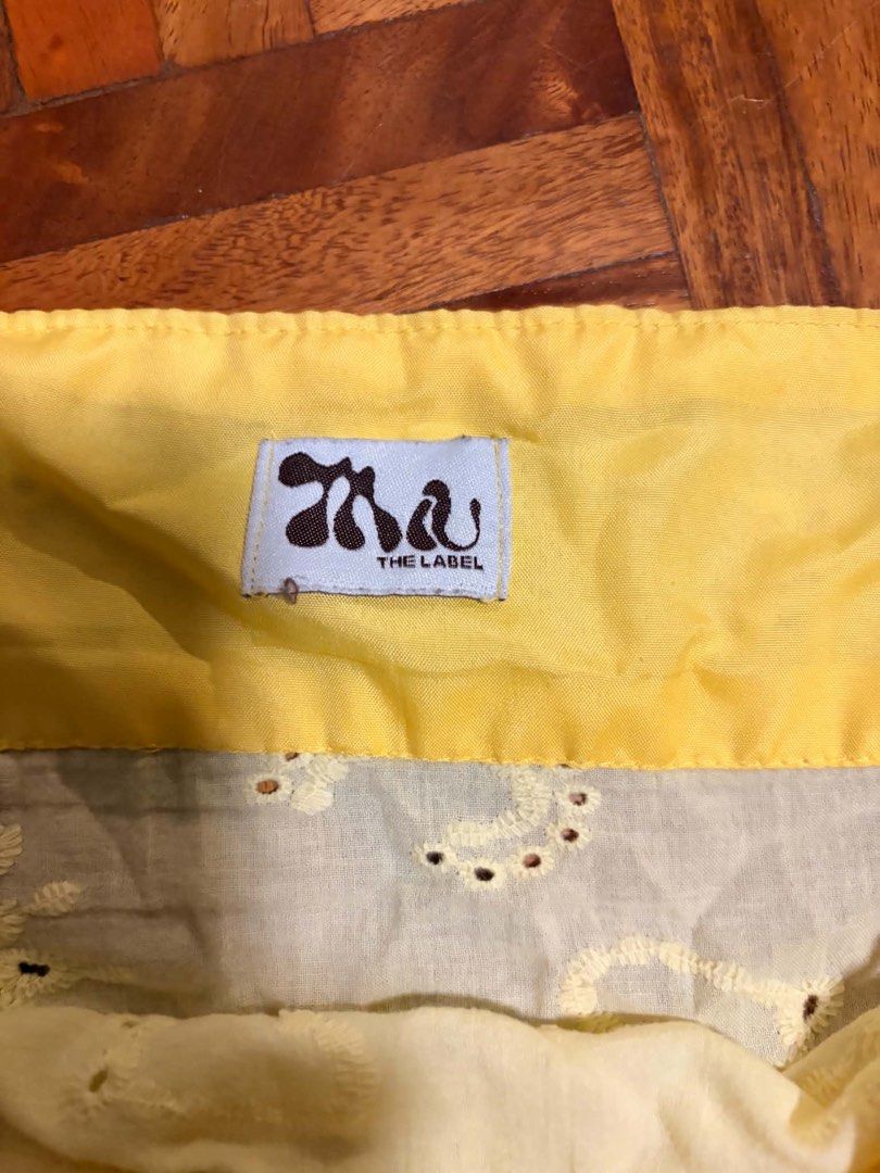 Miu the Label Soleil Eyelet Top (Category: Sleeveless) located in Rizal. Submitted by mikaria715 (Listing ID 1470513111, Image 3). Description: - Soleil Eyelet Top in Yellow - Used only once or twice.