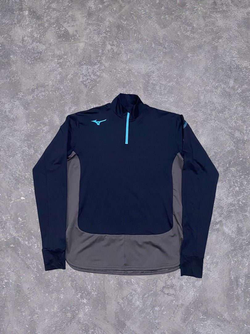 Mizuno Training Jacket size Small (Category: Coats, Jackets and Outerwear) located in Baguio. Submitted by chicoroy (Listing ID 1470465692, Image 1). Description: - Brand: Mizuno - Color: Navy blue with grey side panels and light blue accents - Size: S Dimes:20/25 Need wash only - Material: 87% polyester, 13% polyurethane blend - Origin: Made in Indonesia - Features: Front half-zip, Mizuno logo on chest and sleeve Baguio location can ship JNT.