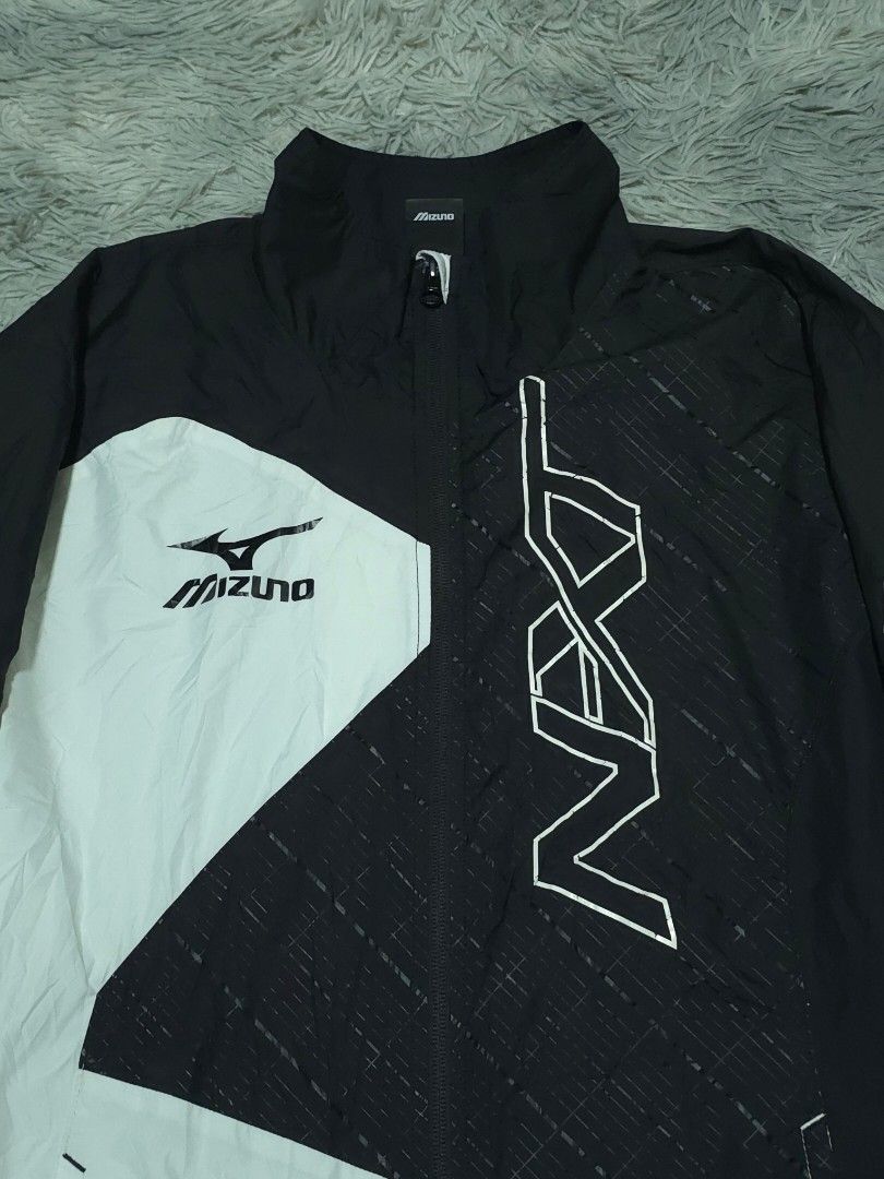 Mizuno Windbreaker Jacket (Category: Coats, Jackets and Outerwear) located in Abulug. Submitted by humanwhosellthings (Listing ID 1470480419, Image 3). Description: MIZUNO WINDBREAKER JACKET ✅️Size: XLarge ✅️Dimes: 22W x 28L ✅Condition: Excellent ✅Issue: minimal hairline sa print ✅Color Rate: 9.8/10.