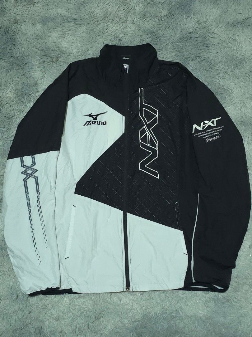 Mizuno Windbreaker Jacket (Category: Coats, Jackets and Outerwear) located in Abulug. Submitted by humanwhosellthings (Listing ID 1470480419, Image 1). Description: MIZUNO WINDBREAKER JACKET ✅️Size: XLarge ✅️Dimes: 22W x 28L ✅Condition: Excellent ✅Issue: minimal hairline sa print ✅Color Rate: 9.8/10.