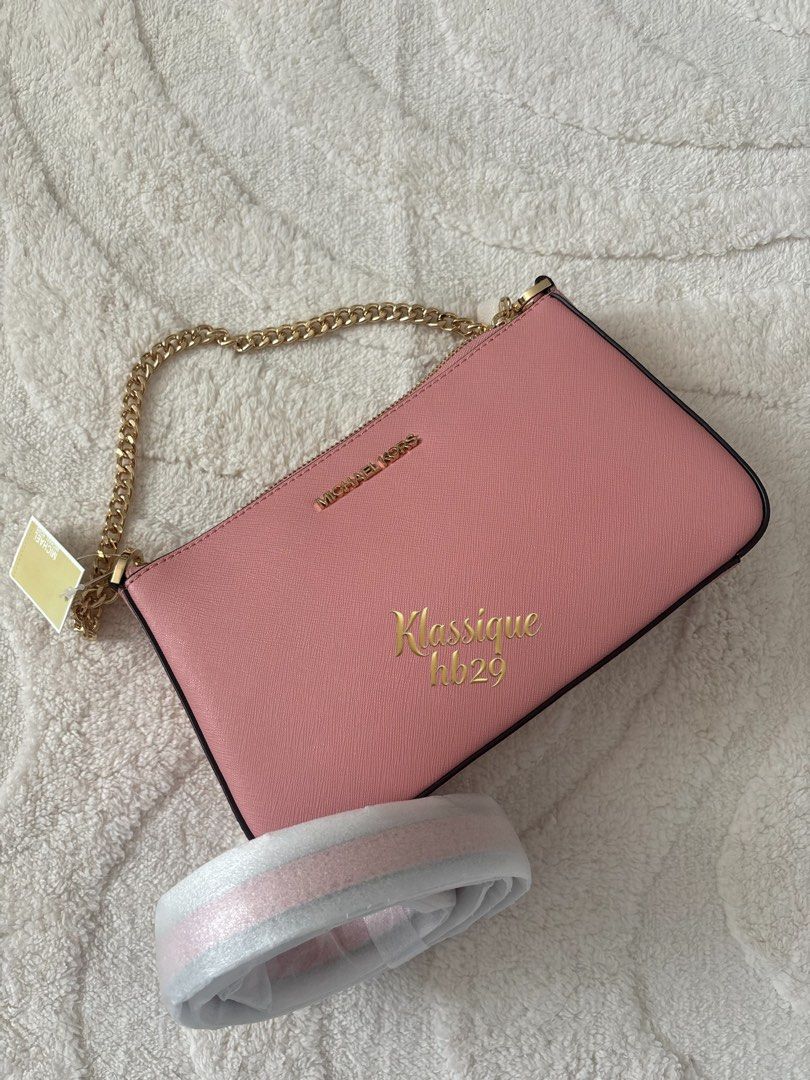 Mk Jet set (Category: Cross-body Bags) located in Lipa City. Submitted by klassique_handbags (Listing ID 1470426192, Image 2). Description: ✅Available✅ ❤️Mk jet set❤️ (Primrose & Black) -Crossbody & shoulder bag -Saffiano leather -100% leather -Gold-tone hardware -9.5”W X 5.5”H X 2.5”D -Adjustable strap: 20.5”-24.5” -Interior details: back slip pocket, 3 front card slots -Lining: 100% polyester -Zip fastening -Dust bag not included 💯original🇨🇦