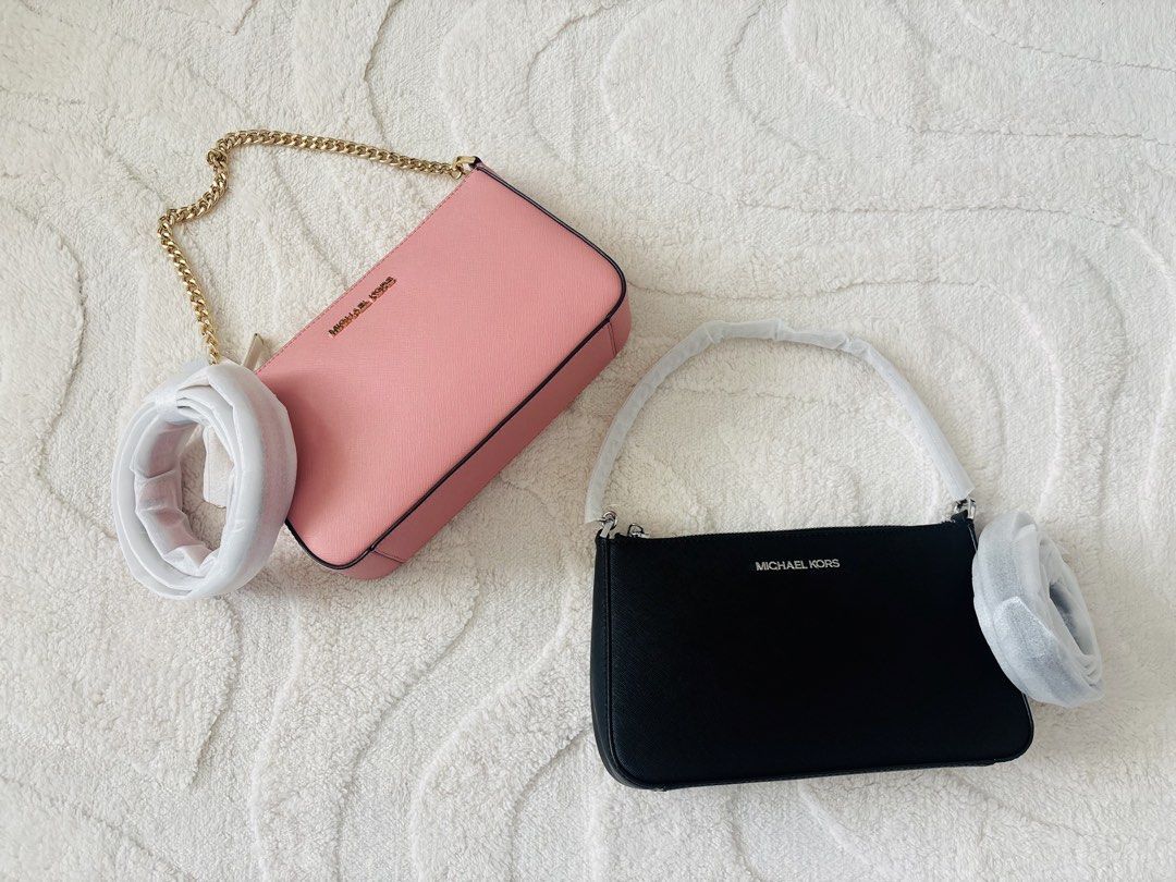 Mk Jet set (Category: Cross-body Bags) located in Lipa City. Submitted by klassique_handbags (Listing ID 1470426192, Image 1). Description: ✅Available✅ ❤️Mk jet set❤️ (Primrose & Black) -Crossbody & shoulder bag -Saffiano leather -100% leather -Gold-tone hardware -9.5”W X 5.5”H X 2.5”D -Adjustable strap: 20.5”-24.5” -Interior details: back slip pocket, 3 front card slots -Lining: 100% polyester -Zip fastening -Dust bag not included 💯original🇨🇦