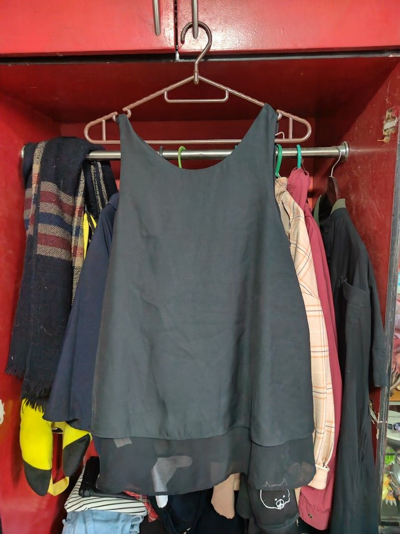 MANGO Basics Black Sleeveless Layered Top Size S (Category: Sleeveless) located in Caloocan City. Submitted by MovesLikeJeager (Listing ID 1470389462, Image 2). Description: - Brand: MNG Basics - Color: Black - Style: Sleeveless top with a layered design and sheer overlay - Size: EUR S, USA XS, MEX CH - Fabric: Lightweight and easy to style - Condition: Clean, no major flaws.