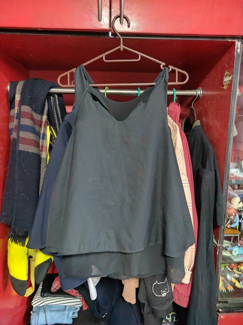 MANGO Basics Black Sleeveless Layered Top Size S (Category: Sleeveless) located in Caloocan City. Submitted by MovesLikeJeager (Listing ID 1470389462, Image 1). Description: - Brand: MNG Basics - Color: Black - Style: Sleeveless top with a layered design and sheer overlay - Size: EUR S, USA XS, MEX CH - Fabric: Lightweight and easy to style - Condition: Clean, no major flaws.
