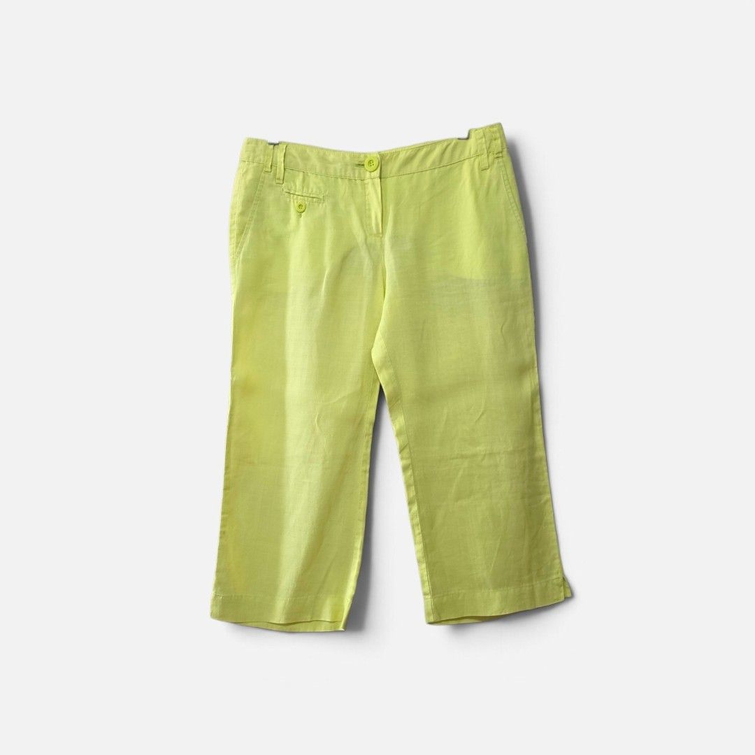 MNG Lime Green Linen Cropped Pants (Category: Jeans) located in Quezon City. Submitted by katya.closet (Listing ID 1470463144, Image 2). Description: - Brand: MNG (rare finds) - Color: Bright lime green - Material: Lightweight linen fabric - Fit: Mid-rise with relaxed calf-length cut - Details: Front button closure, belt loops, back welt pockets with buttons - Condition: Clean inside and out - Style Tip: Great for warm weather, pair with a simple